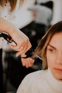 woman getting her hair done