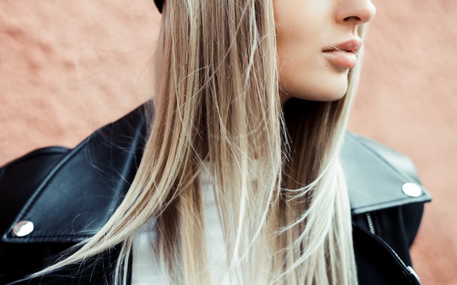 woman wearing black leather jacket